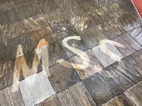 MSS Name written in dirty tile