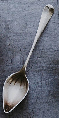 Metal spoon to be used as a scraping tool