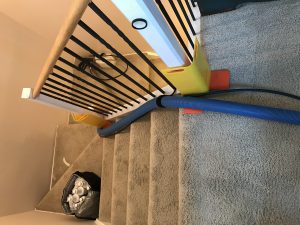 Corner guards and hose hook used to protect property during Denver CO carpet cleaning job