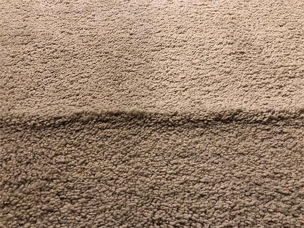 What caused my carpets to buckle and wrinkle?