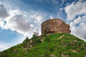 Castle Rock, CO with blue sky behind
